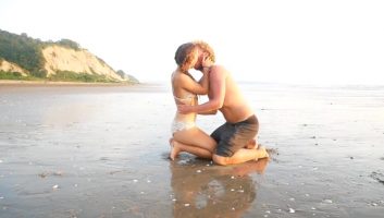 Real couple passionately fuck on a beach